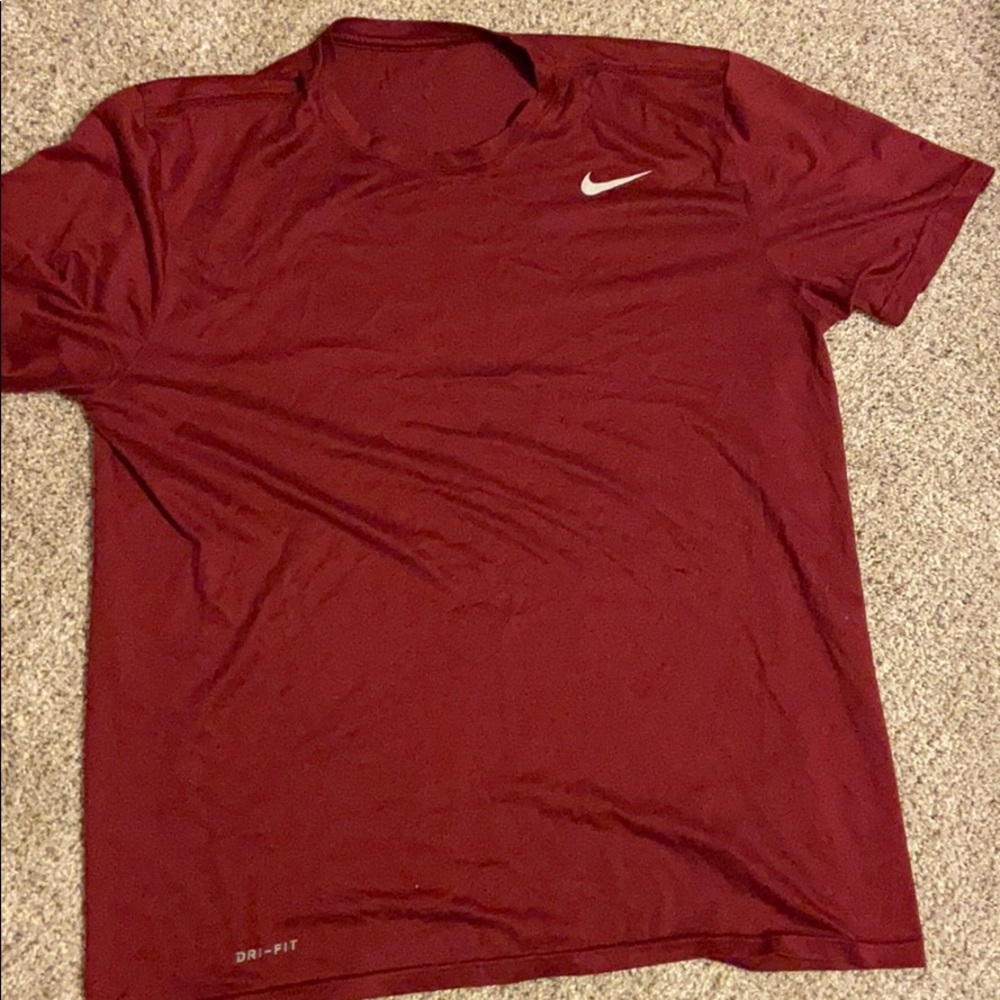 Red Nike athletic shirt